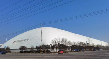 优发国际6万8平米超大体量气膜料场，15天完工！